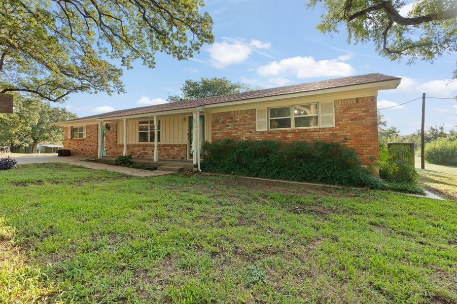 Front exterior of a new home in , Alvarado, TX, highlighting curb appeal (Image 19).
