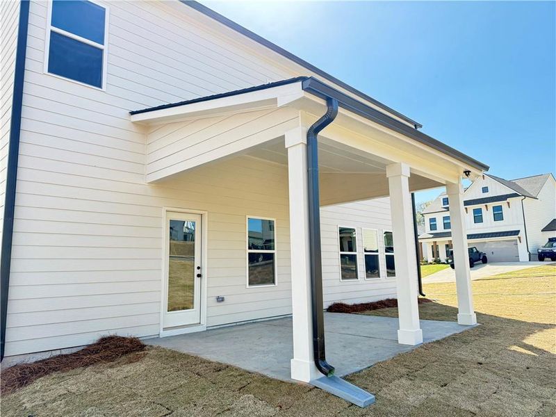 Exterior details and patio area of a home in Ponderosa Farms Estates, Gainesville (Image 4).