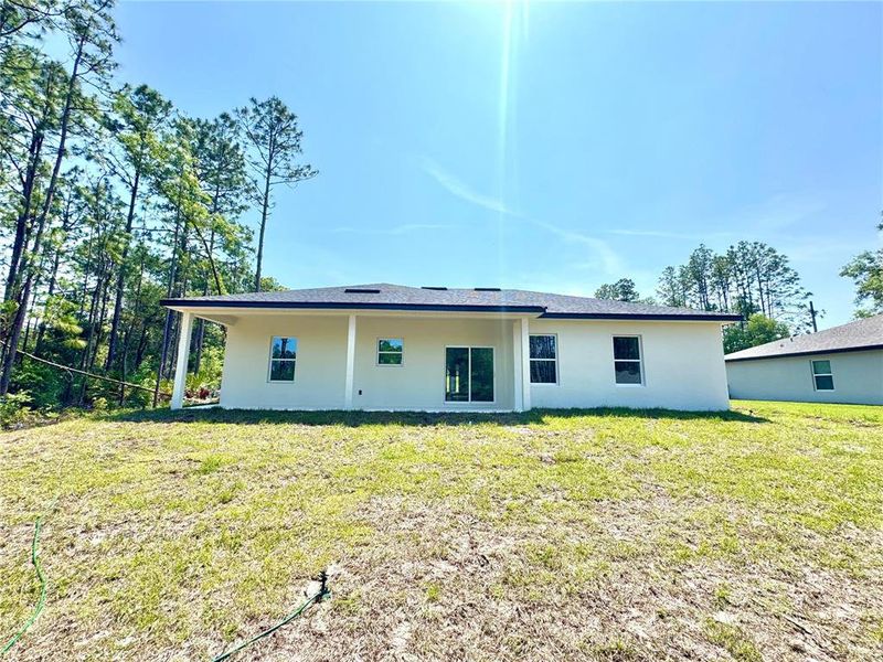Exterior details and patio area of a home in , Citrus Springs (Image 19).