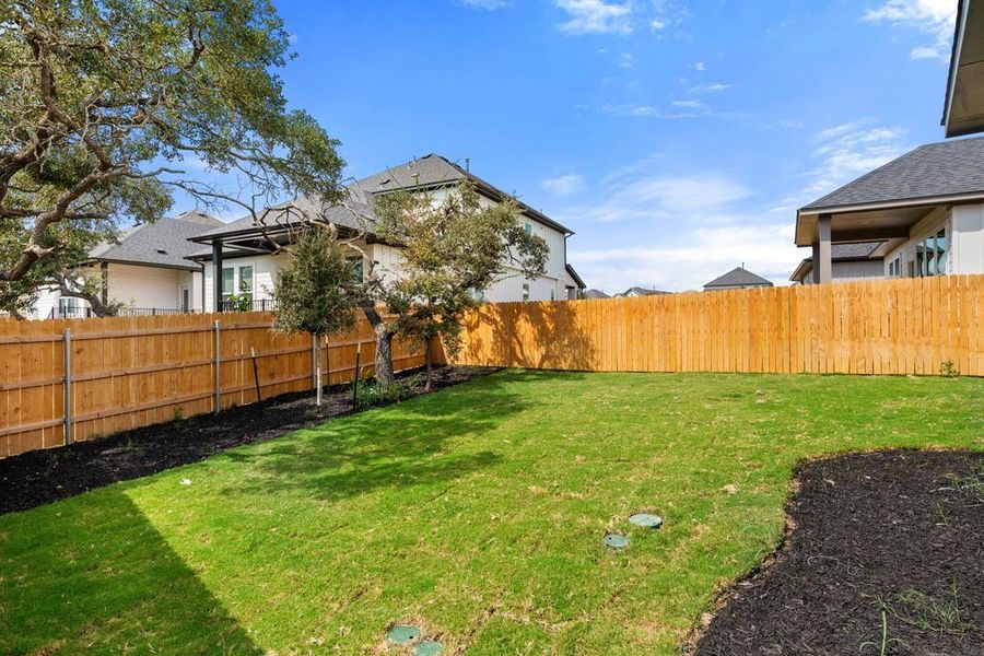 Exterior details and patio area of a home in Heritage, Dripping Springs (Image 3).