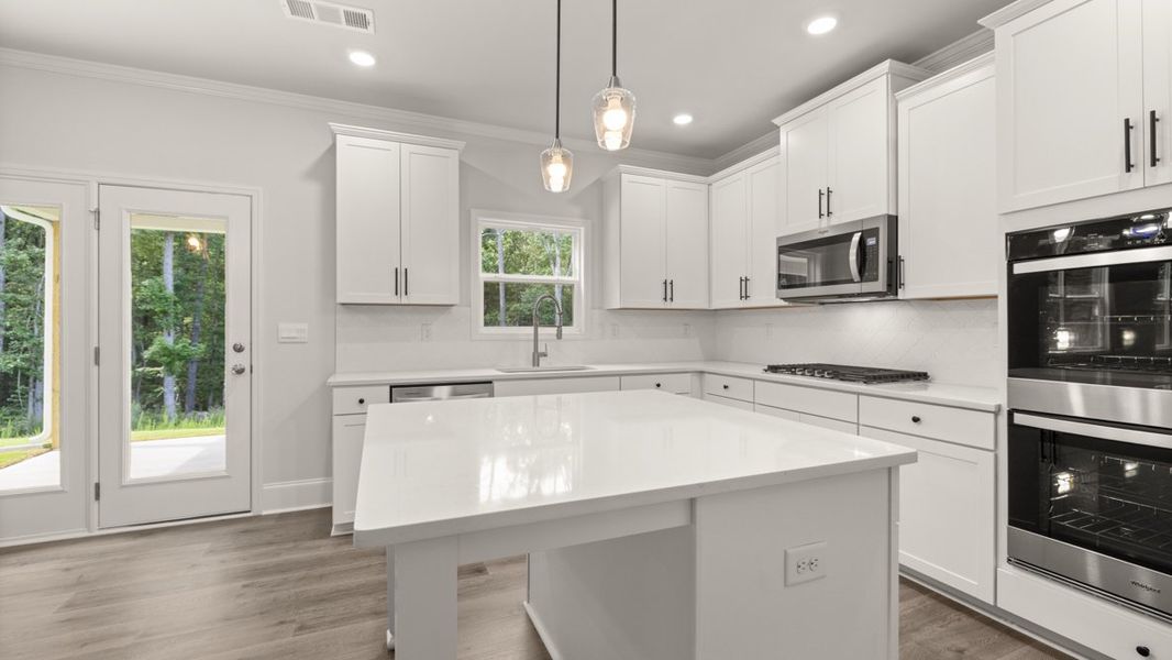 Representative furnished interior of a home built from the Grayson by D.R. Horton in Holland Estates, Powder Springs (Image 6).