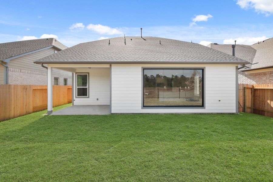 Exterior details and patio area of a home in Barton Creek Ranch, Conroe (Image 1). Exterior details and patio area of a home in Barton Creek Ranch, Conroe (Image 1).