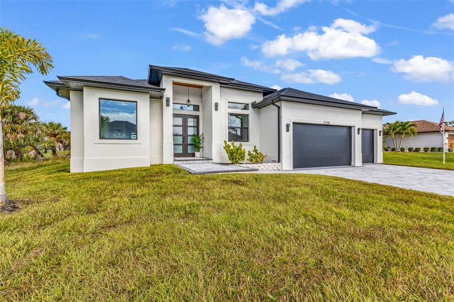 Front exterior of a new home in , Rotonda West, FL, highlighting curb appeal (Image 29). Front exterior of a new home in , Rotonda West, FL, highlighting curb appeal (Image 29).
