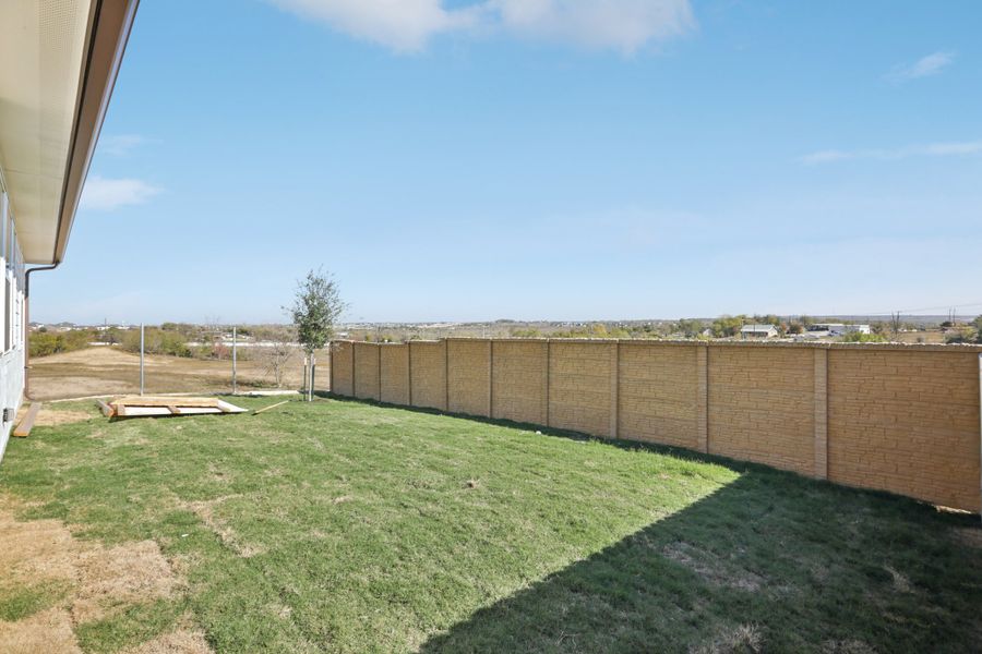 Exterior details and patio area of a home in Porter Country, Buda (Image 18).