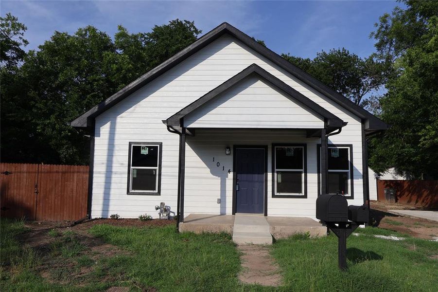 Bungalow-style home with covered porch Bungalow-style home with covered porch
