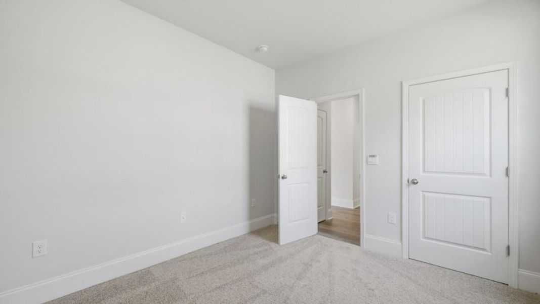 Spacious, unfurnished interior of a new home in Haven Abbey, Cumming (Image 29).