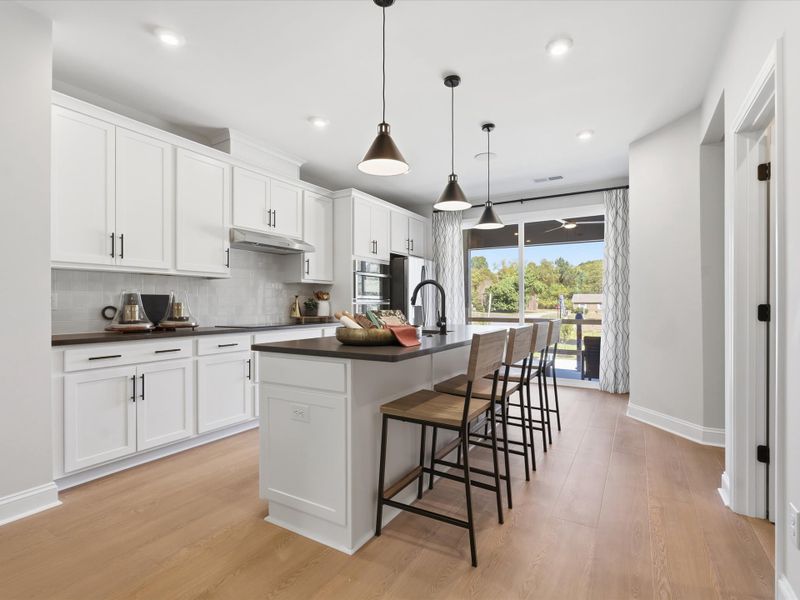 Representative furnished interior of a home built from the Dahlia by Tri Pointe Homes in Bellflower, Charlotte (Image 8).