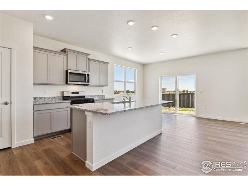 Furnished interior view inside a new home in Silver Peaks, Lochbuie (Image 7).