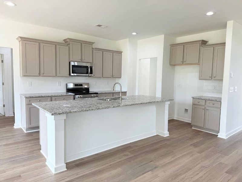 Furnished interior view inside a new home in Westlyn, Winder (Image 9).