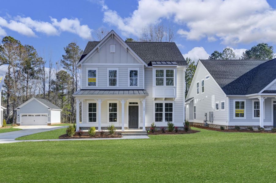Front exterior of a new home in Clubside Reserve at Summerlake, Lexington, SC, highlighting curb appeal (Image 1). Front exterior of a new home in Clubside Reserve at Summerlake, Lexington, SC, highlighting curb appeal (Image 1).