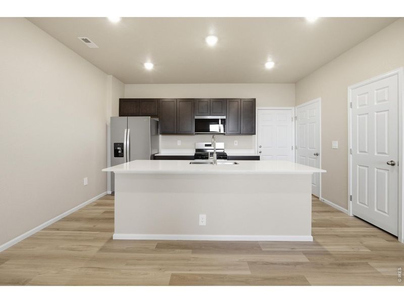 Furnished interior view inside a new home in Poudre Heights: The Meadow Collection, Windsor (Image 7).