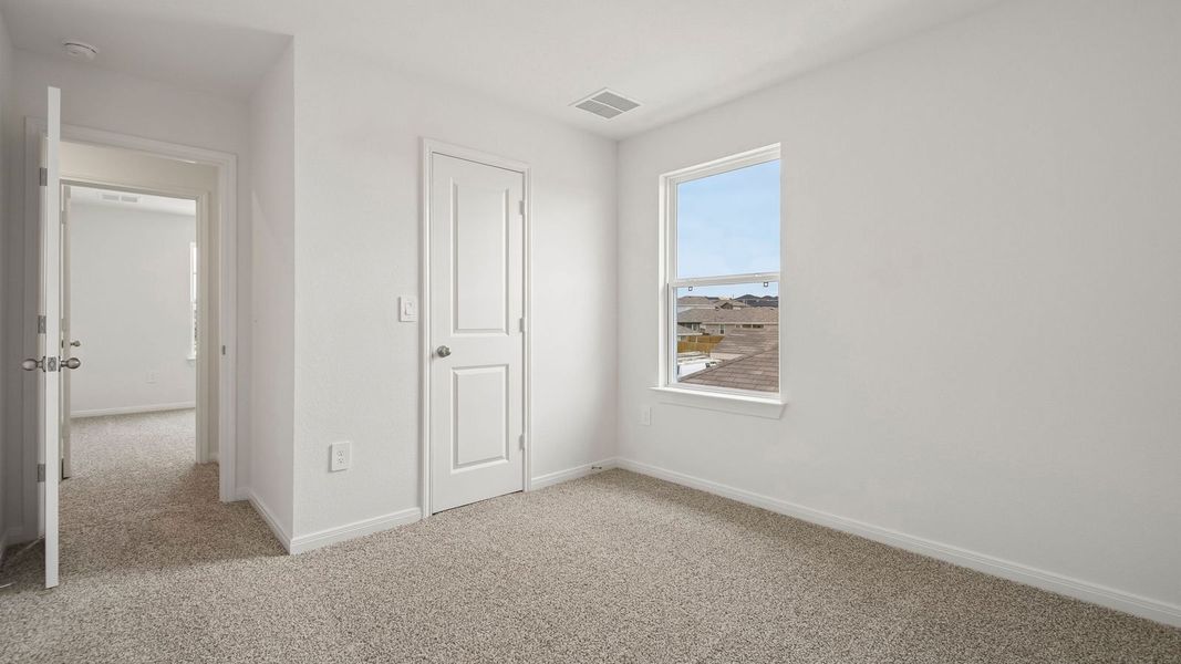 Spacious, unfurnished interior of a new home in Prairie Lakes, Buda (Image 33).