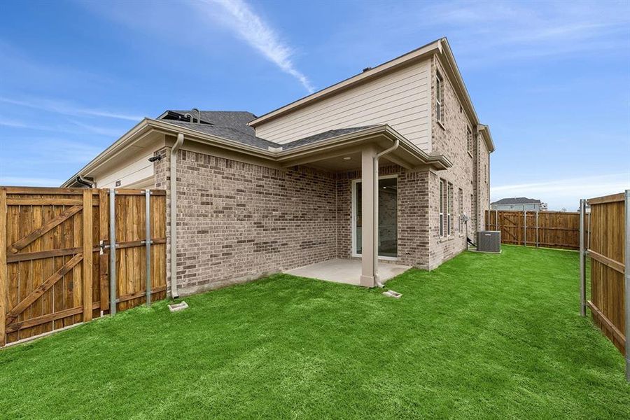 Exterior details and patio area of a home in Lexington Frisco, Frisco (Image 17).