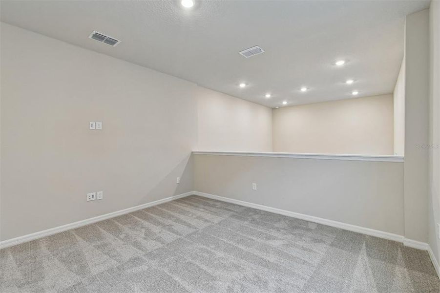 Spacious, unfurnished interior of a new home in Laureate Park at Lake Nona - Garden Series, Orlando (Image 18).