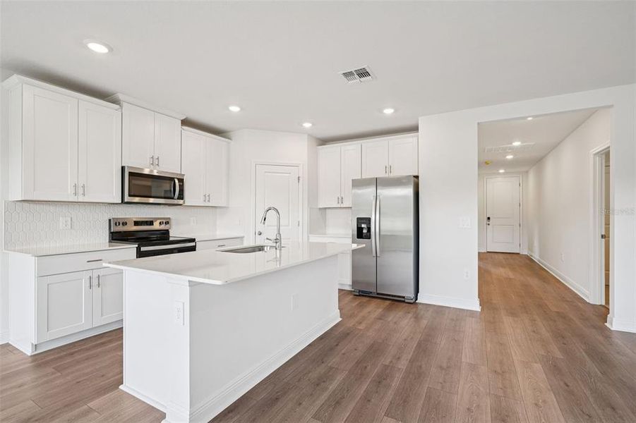 Furnished interior view inside a new home in The Reserve at Hammock Oaks - Signature Series, Lady Lake (Image 6).