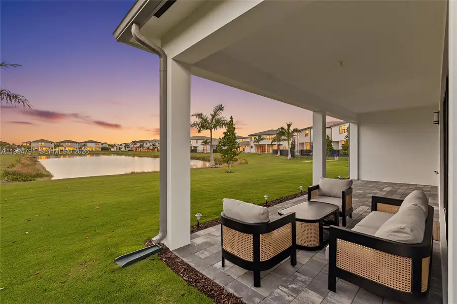 west-facing covered patio and backyard