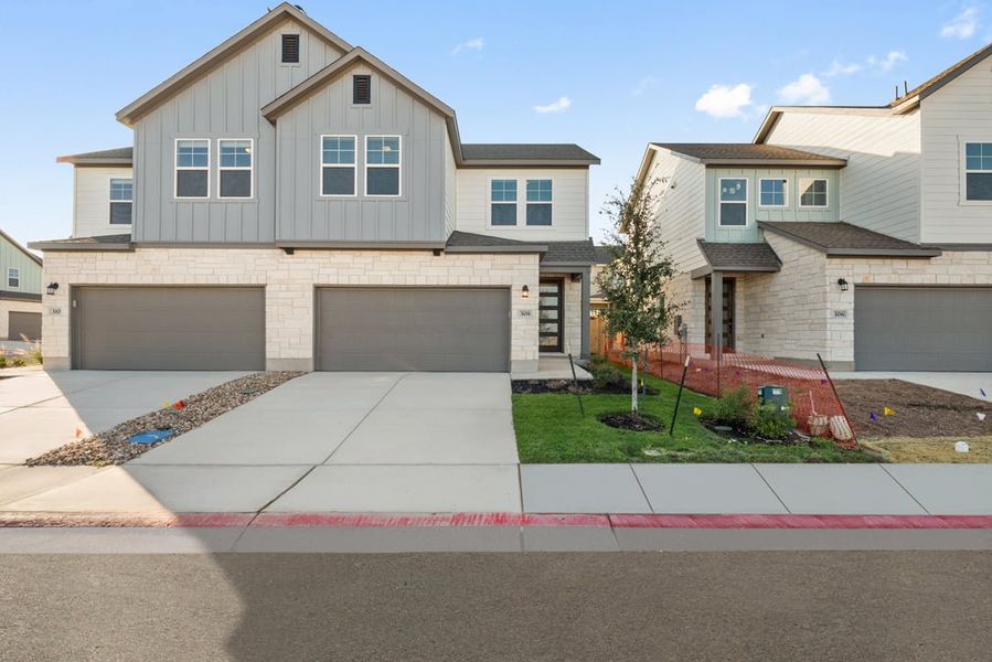 Front exterior of a new home in Union Collection at Park Central, Georgetown, TX, highlighting curb appeal (Image 1). Front exterior of a new home in Union Collection at Park Central, Georgetown, TX, highlighting curb appeal (Image 1).