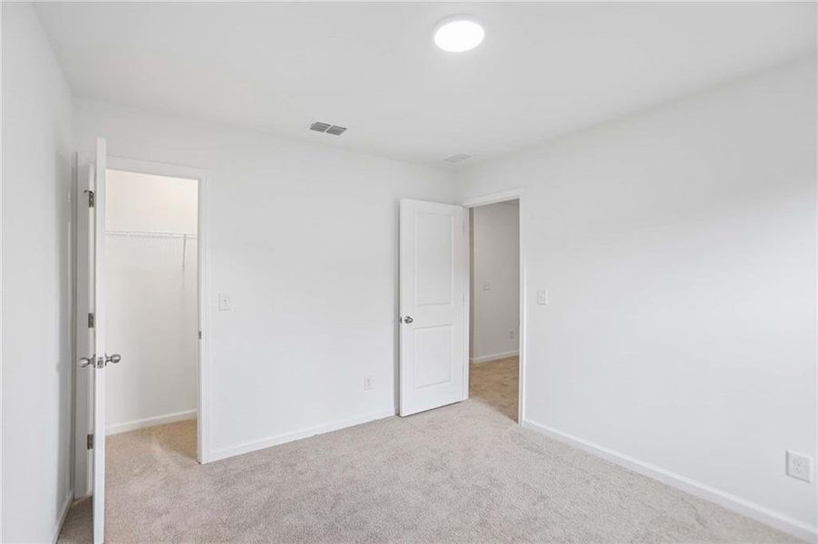Spacious, unfurnished interior of a new home in The Pointe at Heron Bay, Locust Grove (Image 23).