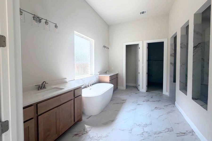 Furnished interior view inside a new home in Walsh, Fort Worth (Image 2). Furnished interior view inside a new home in Walsh, Fort Worth (Image 2).