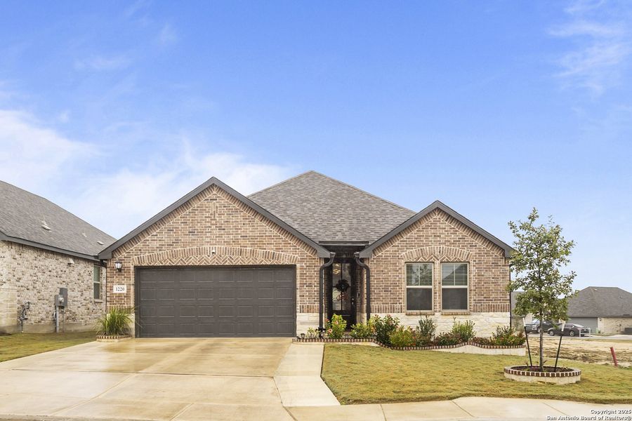 Front exterior of a new home in , San Antonio, TX, highlighting curb appeal (Image 1). Front exterior of a new home in , San Antonio, TX, highlighting curb appeal (Image 1).