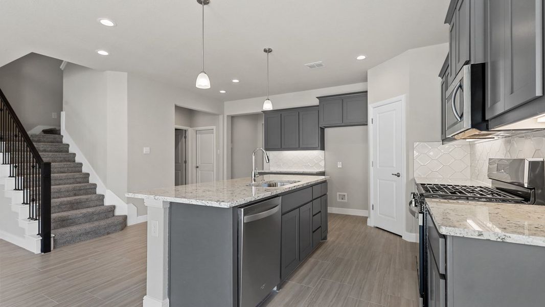 Furnished interior view inside a new home in Treeline, Justin (Image 8).