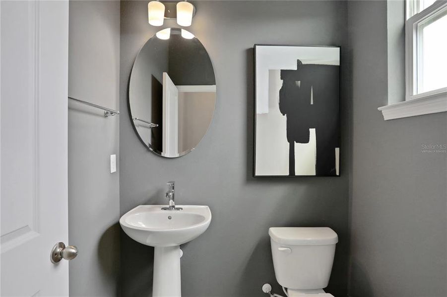 Furnished interior view inside a new home in Serenade at Ovation, Winter Garden (Image 10).