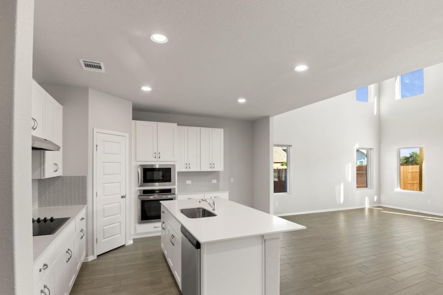 Furnished interior view inside a new home in Oaks at San Gabriel, Georgetown (Image 6).