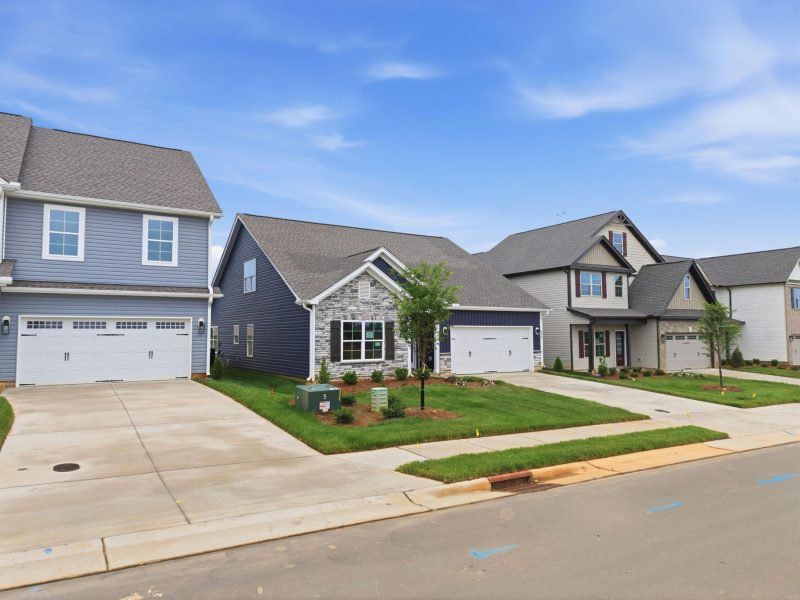 Front exterior of a new home in Sullivans Reserve, Walkertown, NC, highlighting curb appeal (Image 27).