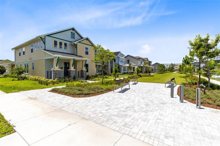 Front exterior of a new home in , Orlando, FL, highlighting curb appeal (Image 22).