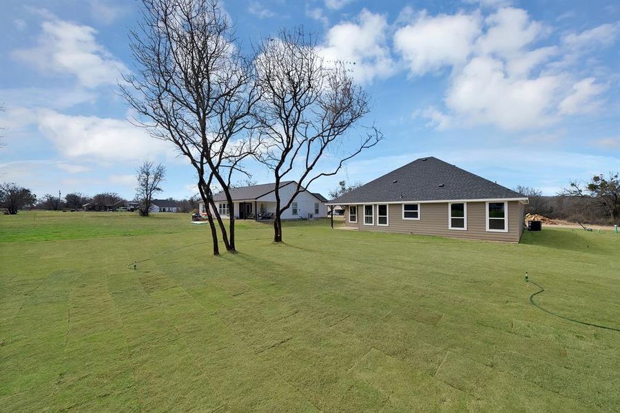 Exterior details and patio area of a home in , Runaway Bay (Image 21). Exterior details and patio area of a home in , Runaway Bay (Image 21).