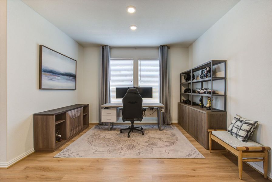 Dining room being used as a home office.
