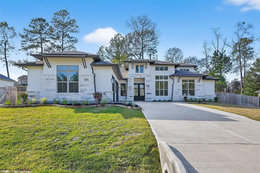 Front exterior of a new home in Stewart’s Forest, Conroe, TX, highlighting curb appeal (Image 2). Front exterior of a new home in Stewart’s Forest, Conroe, TX, highlighting curb appeal (Image 2).