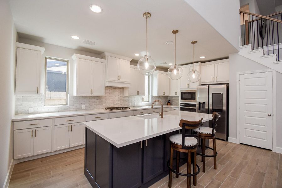 Furnished interior view inside a new home in Marvida, Cypress (Image 32).