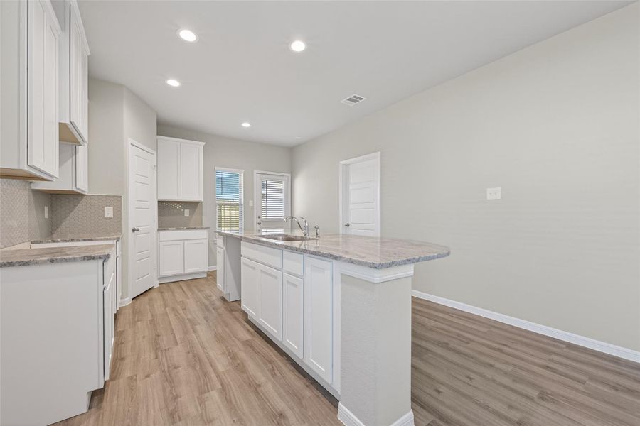 Furnished interior view inside a new home in Woodland Lakes, Huffman (Image 5).