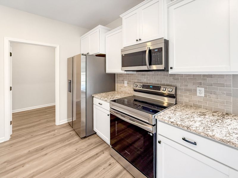 Furnished interior view inside a new home in The Village at Sassafras, Allenhurst (Image 6). Furnished interior view inside a new home in The Village at Sassafras, Allenhurst (Image 6).