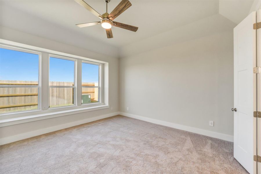 Spacious, unfurnished interior of a new home in Sunterra, Katy (Image 32).