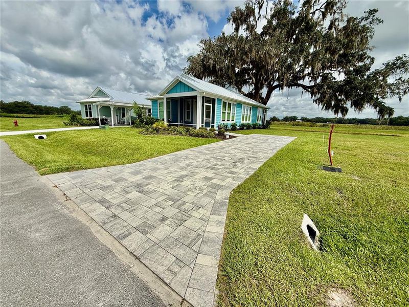 Front exterior of a new home in , Oxford, FL, highlighting curb appeal (Image 18).
