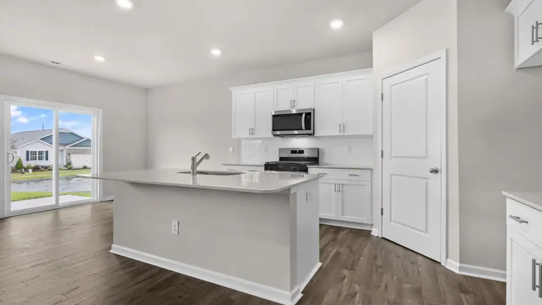 Furnished interior view inside a new home in The Reserve at Prestleigh, Wake Forest (Image 5).