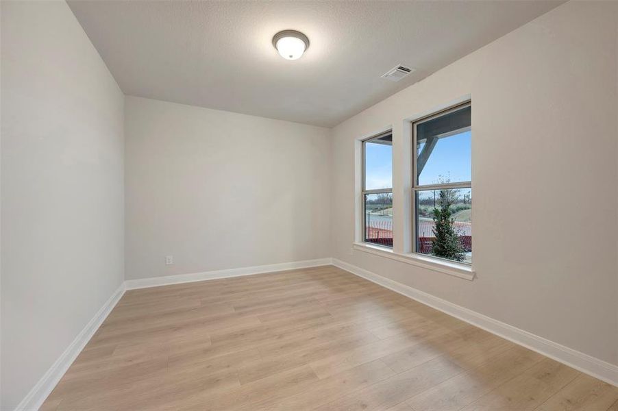 Spacious, unfurnished interior of a new home in Karis - Village Series, Crowley (Image 30).