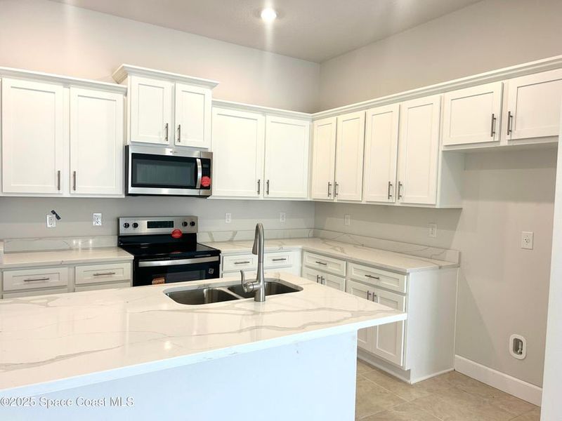 Furnished interior view inside a new home in St. John Preserve, Palm Bay (Image 5). Furnished interior view inside a new home in St. John Preserve, Palm Bay (Image 5).