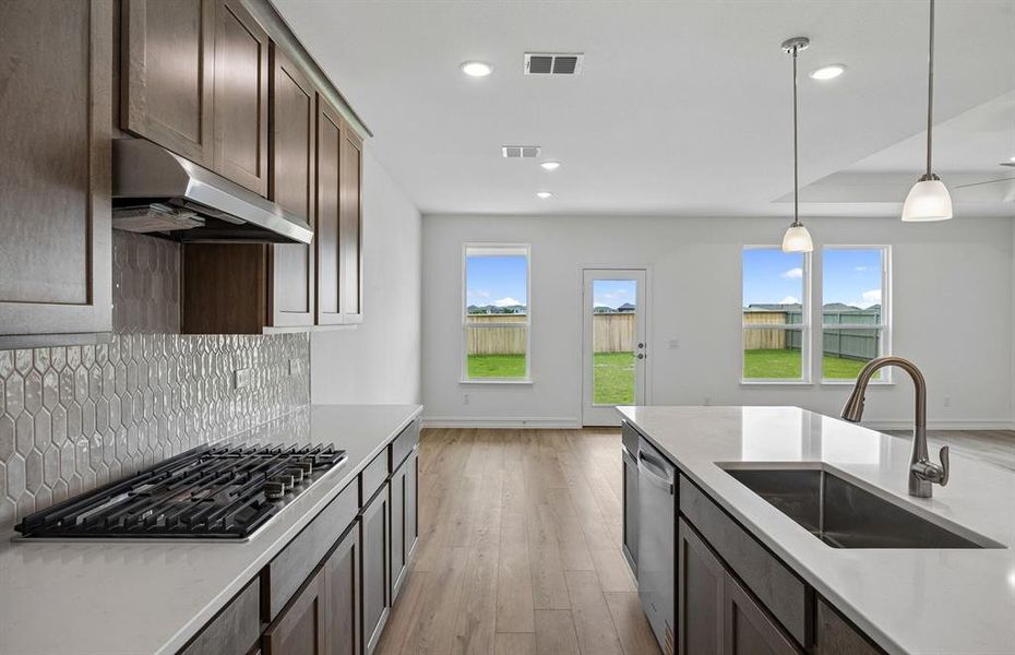 Kitchen overlooking gathering room