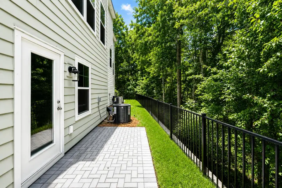 Exterior details and patio area of a home in , Johns Island (Image 3).