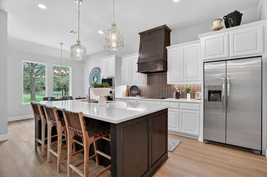 Representative furnished interior of a home built from the Wichita by Cheldan Homes in Arbor Oaks, Boyd (Image 15).