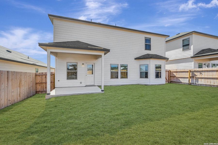 Exterior details and patio area of a home in Paloma Park, Converse (Image 21).