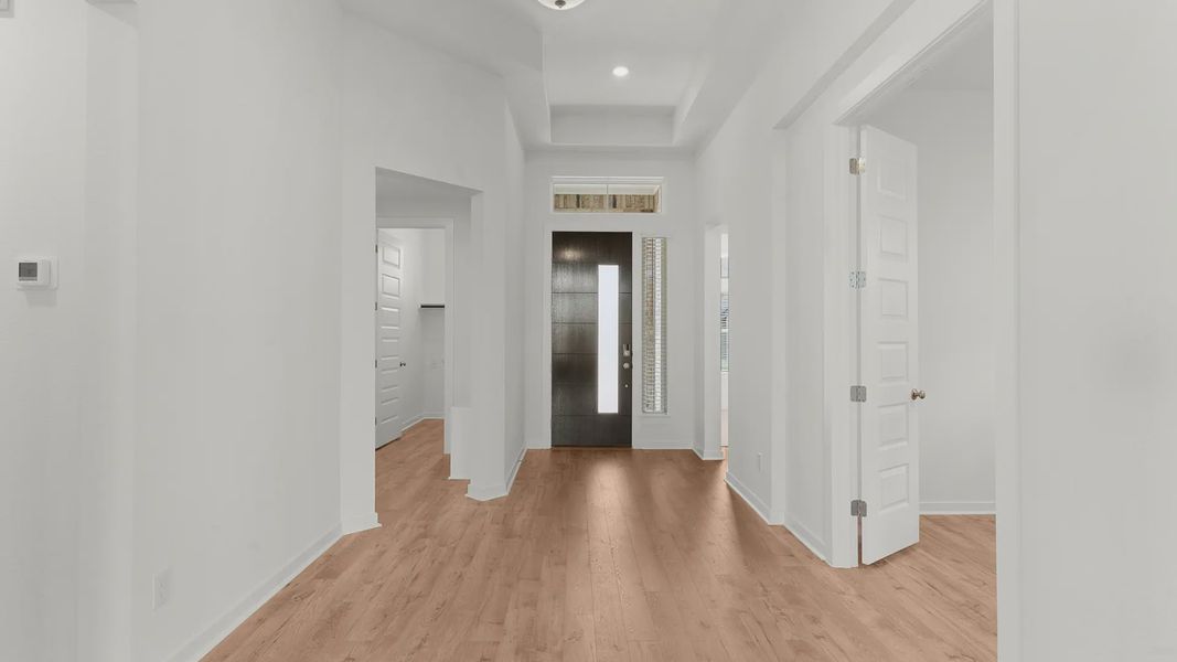 Representative unfurnished interior of a home built from the Bryson by Chesmar Homes in Newhaven, Manor (Image 10).