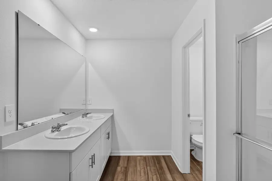 Representative furnished interior of a home built from the Kingfisher by Taylor Morrison in Palm Wind, Hudson (Image 10).