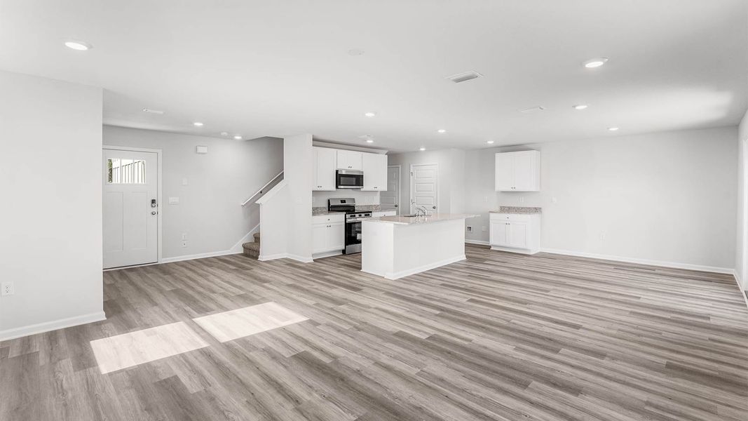 Representative unfurnished interior of a home built from the The Aisle by D.R. Horton in Chateau Nemours, Port Saint Joe (Image 19).