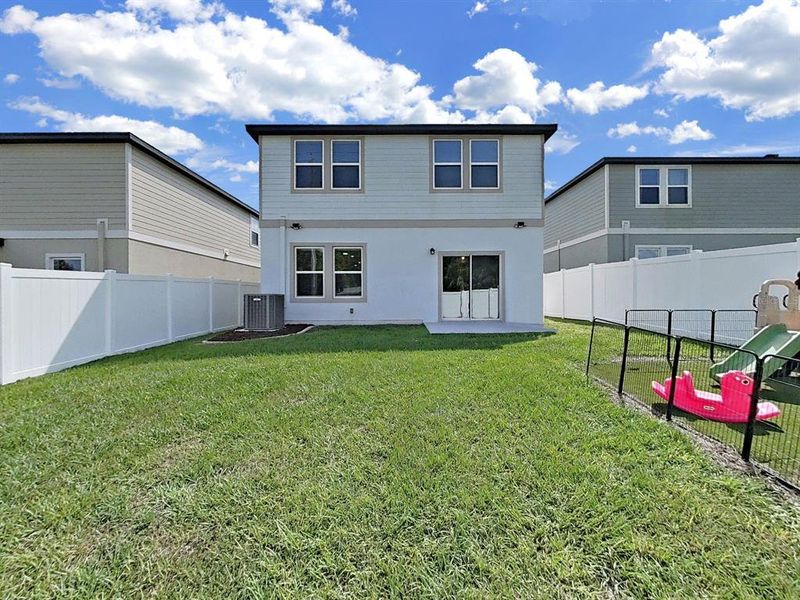 Exterior details and patio area of a home in Clinton Corner, Dade City (Image 2).