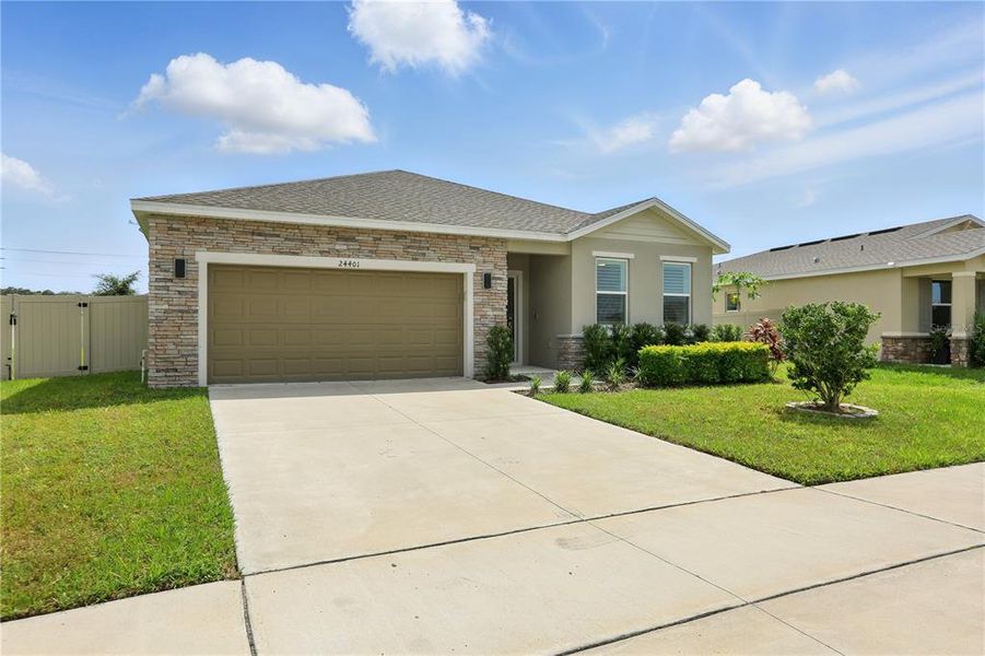 Front exterior of a new home in Sorrento Pines, Sorrento, FL, highlighting curb appeal (Image 18). Front exterior of a new home in Sorrento Pines, Sorrento, FL, highlighting curb appeal (Image 18).