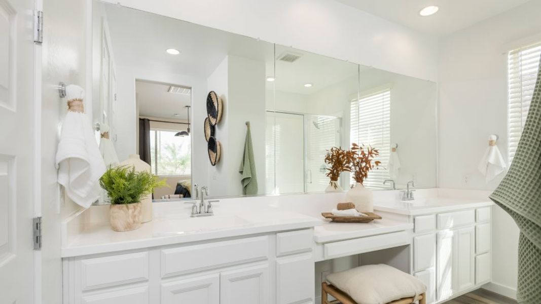 Owner's suite bathroom with double vanities